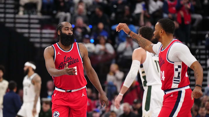 Jan 25, 2025; Inglewood, California, USA; LA Clippers guard James Harden (1) and guard Norman Powell (24) celebrate in the second half against the Milwaukee Bucks at Intuit Dome. Mandatory Credit: Kirby Lee-Imagn Images