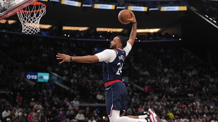 Feb 12, 2025; Inglewood, California, USA; LA Clippers guard Norman Powell (24) dunks against the Memphis Grizzlies in the second half at Intuit Dome. Mandatory Credit: Kirby Lee-Imagn Images
