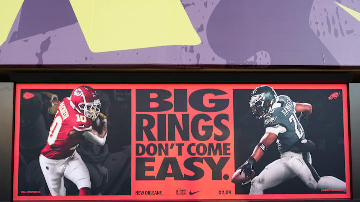 Feb 3, 2025; New Orleans, LA, USA; A Nike Super Bowl LIX advertisement with images of Kansas City Chiefs running back Isiah Pacheco (left) and Philadelphia Eagles running back Saquon Barkley at the Caesars Superdome. Mandatory Credit: Kirby Lee-Imagn Images