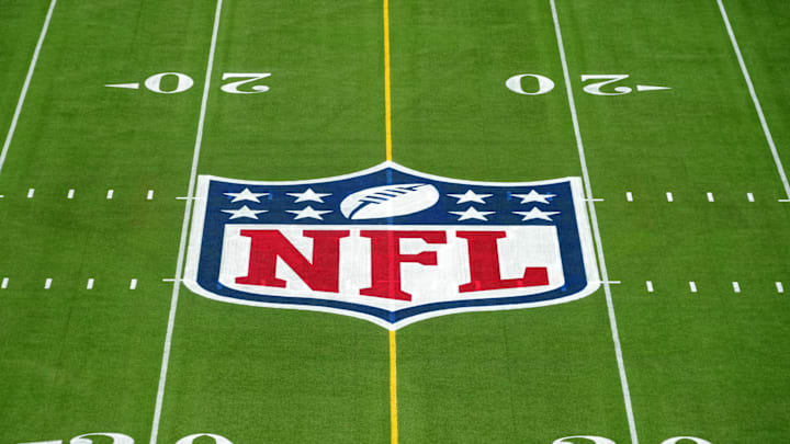 Feb 1, 2025; Orlando, FL, USA; An overall view of the NFL shield logo at midfield on the Camping World Stadium flag football field. Mandatory Credit: Kirby Lee-Imagn Images