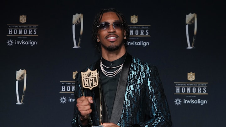 Feb 6, 2025; New Orleans, LA, USA; Washington Commanders quarterback Jayden Daniels poses with the Offensive Rookie of the Year award during Super Bowl LIX NFL Honors at Saenger Theatre. Mandatory Credit: Kirby Lee-Imagn Images