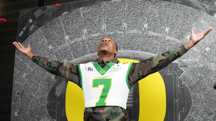 Dec 30, 2024; Los Angeles, CA, USA; Oregon Ducks wide receiver Evan Stewart (7) poses during Rose Bowl media day at Sheraton Grand LA. Mandatory Credit: Kirby Lee-Imagn Images
