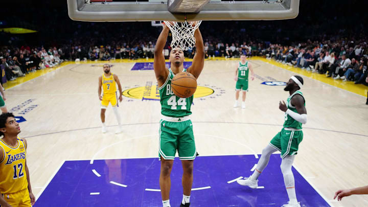 Jan 23, 2025; Los Angeles, California, USA; Boston Celtics guard Jaden Springer (44) dunks the ball against the Los Angeles Lakers in the second half at the Crypto.com Arena. Mandatory Credit: Kirby Lee-Imagn Images