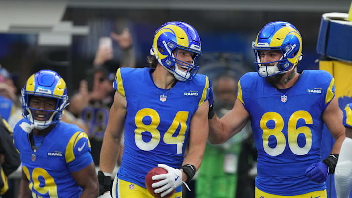 Dec 8, 2024; Inglewood, California, USA; Los Angeles Rams tight end Hunter Long (84) celebrates with wide receiver Xavier Smith (19) and tight end Colby Parkinson (86) after scoring a touchdown on a blocked punt against the Buffalo Bills in the first half at SoFi Stadium. Mandatory Credit: Kirby Lee-Imagn Images Dec 8, 2024; Inglewood, California, USA; Los Angeles Rams tight end Hunter Long (84) celebrates with wide receiver Xavier Smith (19) and tight end Colby Parkinson (86) after scoring a touchdown on a blocked punt against the Buffalo Bills in the first half at SoFi Stadium. Mandatory Credit: Kirby Lee-Imagn Images