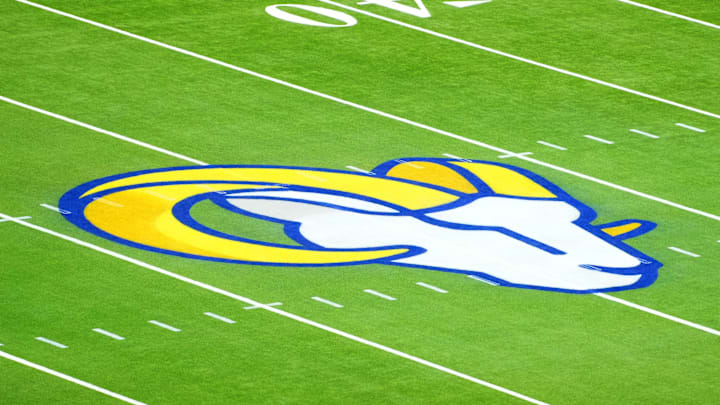 Dec 28, 2024; Inglewood, California, USA; The Los Angeles Rams logo is seen at midfield at SoFi Stadium before a game between the Arizona Cardinals and Los Angeles Rams. Mandatory Credit: Kirby Lee-Imagn Images Dec 28, 2024; Inglewood, California, USA; The Los Angeles Rams logo is seen at midfield at SoFi Stadium before a game between the Arizona Cardinals and Los Angeles Rams. Mandatory Credit: Kirby Lee-Imagn Images