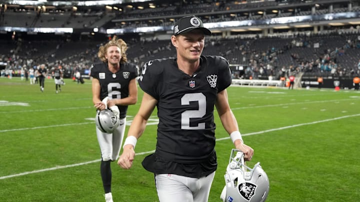 Dec 22, 2024; Paradise, Nevada, USA; Las Vegas Raiders place kicker Daniel Carlson (2) and punter AJ Cole (6) leave the field after the game against the Jacksonville Jaguars Allegiant Stadium. Mandatory Credit: Kirby Lee-Imagn Images Dec 22, 2024; Paradise, Nevada, USA; Las Vegas Raiders place kicker Daniel Carlson (2) and punter AJ Cole (6) leave the field after the game against the Jacksonville Jaguars Allegiant Stadium. Mandatory Credit: Kirby Lee-Imagn Images