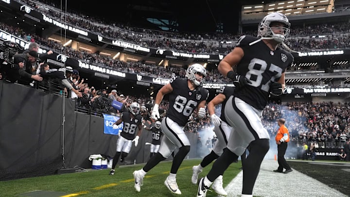 Dec 22, 2024; Paradise, Nevada, USA; Las Vegas Raiders tight end Michael Mayer (87) and tight end John Samuel Shenker (86) enter the field before the game against the Jacksonville Jaguars Allegiant Stadium. Mandatory Credit: Kirby Lee-Imagn Images