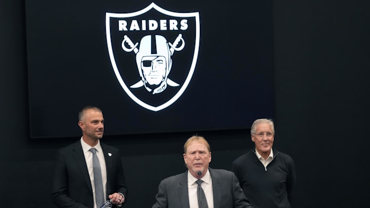 Jan 27, 2025; Las Vegas, NV, USA; Las Vegas Raiders owner Mark Davis (center) introduces general manager John Spytek (left) and coach Pete Carroll at press conference at Intermountain Health Performance Center. Mandatory Credit: Kirby Lee-Imagn Images Jan 27, 2025; Las Vegas, NV, USA; Las Vegas Raiders owner Mark Davis (center) introduces general manager John Spytek (left) and coach Pete Carroll at press conference at Intermountain Health Performance Center. Mandatory Credit: Kirby Lee-Imagn Images