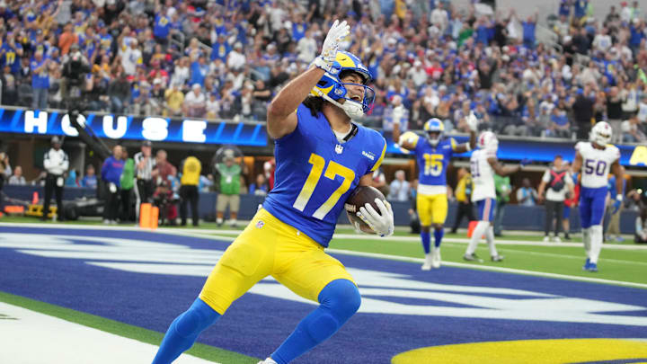 Dec 8, 2024; Inglewood, California, USA; Los Angeles Rams wide receiver Puka Nacua (17) celebrates scores on a 4-yard touchdown run in the second quarter against the Buffalo Bills  at SoFi Stadium. Mandatory Credit: Kirby Lee-Imagn Images