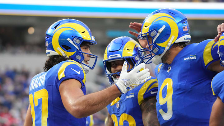 Dec 8, 2024; Inglewood, California, USA; Los Angeles Rams wide receiver Puka Nacua (17) celebrates with quarterback Matthew Stafford (9) and running back Kyren Williams (23) after scoring on a 4-yard touchdown run in the second quarter against the Buffalo Bills at SoFi Stadium. Mandatory Credit: Kirby Lee-Imagn Images