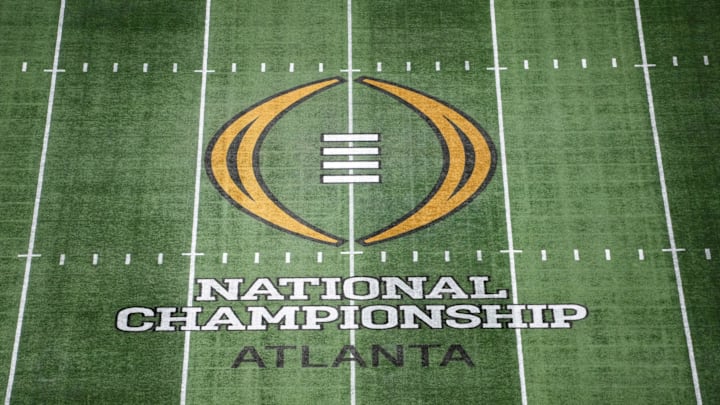 The College Football Playoff National Championship logo at midfield at Mercedes-Benz Stadium, the site of the 2025 College Football Playoff National Championship between the Ohio State Buckeyes and the Notre Dame Fighting Irish. 