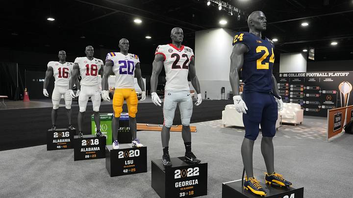 Jan 18, 2025; Atlanta, GA, USA; A display honoring previous national champions Alabama (2016 and 18), LSU (2020), Georgia (2022) and Michigan (2024) at the College Football Playoff Fan Central at the Georgia World Congress Center. Mandatory Credit: Kirby Lee-Imagn Images Jan 18, 2025; Atlanta, GA, USA; A display honoring previous national champions Alabama (2016 and 18), LSU (2020), Georgia (2022) and Michigan (2024) at the College Football Playoff Fan Central at the Georgia World Congress Center. Mandatory Credit: Kirby Lee-Imagn Images