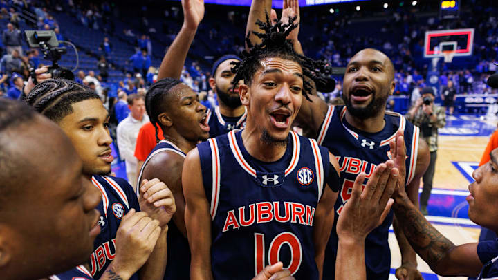 Mar 1, 2025; Lexington, Kentucky, USA; Auburn Tigers guard Chad Baker-Mazara (10) celebrates with his teammates after the game against the Kentucky Wildcats at Rupp Arena at Central Bank Center. Mandatory Credit: Jordan Prather-Imagn Images