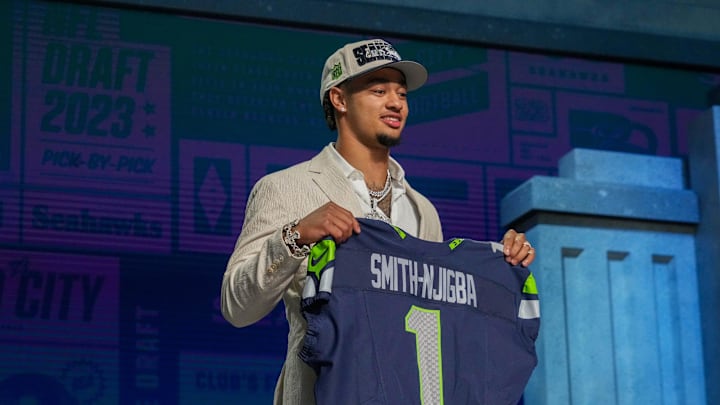 Apr 27, 2023; Kansas City, MO, USA; Ohio State wide receiver Jaxon Smith-Njigba on stage after being selected by the Seattle Seahawks twentieth overall in the first round of the 2023 NFL Draft at Union Station. Mandatory Credit: Kirby Lee-Imagn Images Apr 27, 2023; Kansas City, MO, USA; Ohio State wide receiver Jaxon Smith-Njigba on stage after being selected by the Seattle Seahawks twentieth overall in the first round of the 2023 NFL Draft at Union Station. Mandatory Credit: Kirby Lee-Imagn Images