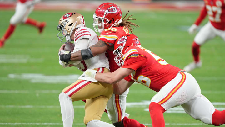 Feb 11, 2024; Paradise, Nevada, USA; Kansas City Chiefs safety Justin Reid (20) and defensive end George Karlaftis (56) tackle San Francisco 49ers quarterback Brock Purdy (13) during the second quarter of Super Bowl LVIII at Allegiant Stadium. Mandatory Credit: Kyle Terada-USA TODAY Sports