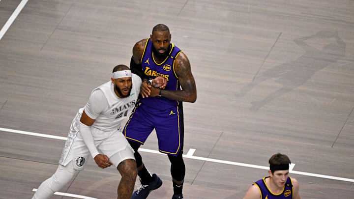 Apr 9, 2025; Dallas, Texas, USA; Dallas Mavericks center Daniel Gafford (21) and Los Angeles Lakers forward LeBron James (23) in action during the game between the Dallas Mavericks and the Los Angeles Lakers at American Airlines Center. Mandatory Credit: Jerome Miron-Imagn Images