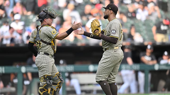 Sep 21, 2025; Chicago, Illinois, USA; San Diego Padres pitcher Robert Suarez (75) celebrates with catcher Freddy Fermin (54) after defeating the Chicago White Sox during the ninth inning at Rate Field. Mandatory Credit: Patrick Gorski-Imagn Images Sep 21, 2025; Chicago, Illinois, USA; San Diego Padres pitcher Robert Suarez (75) celebrates with catcher Freddy Fermin (54) after defeating the Chicago White Sox during the ninth inning at Rate Field. Mandatory Credit: Patrick Gorski-Imagn Images