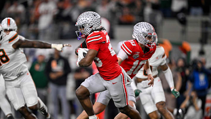 Dec 31, 2025; Arlington, TX, USA; Ohio State Buckeyes quarterback Julian Sayin (10) hands the ball off to running back Bo Jackson (25) during the 2025 Cotton Bowl and quarterfinal game of the College Football Playoff at AT&T Stadium. Mandatory Credit: Jerome Miron-Imagn Images