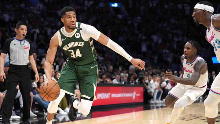 Apr 5, 2025; Miami, Florida, USA; Milwaukee Bucks forward Giannis Antetokounmpo (34) drives to the basket as Miami Heat guard Davion Mitchell (45) and center Bam Adebayo (13) defend during the second half at Kaseya Center. Mandatory Credit: Jim Rassol-Imagn Images Apr 5, 2025; Miami, Florida, USA; Milwaukee Bucks forward Giannis Antetokounmpo (34) drives to the basket as Miami Heat guard Davion Mitchell (45) and center Bam Adebayo (13) defend during the second half at Kaseya Center. Mandatory Credit: Jim Rassol-Imagn Images