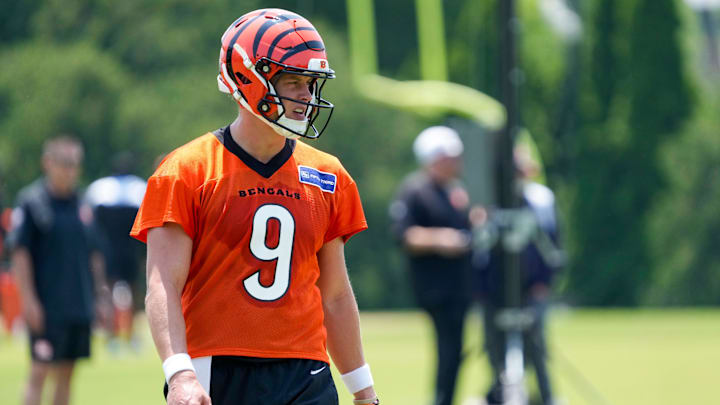 Cincinnati Bengals quarterback Joe Burrow (9) prepares for a play during a session of organized team activities on the Bengals practice field at Paycor Stadium in downtown Cincinnati on Tuesday, June 3, 2025. Cincinnati Bengals quarterback Joe Burrow (9) prepares for a play during a session of organized team activities on the Bengals practice field at Paycor Stadium in downtown Cincinnati on Tuesday, June 3, 2025.