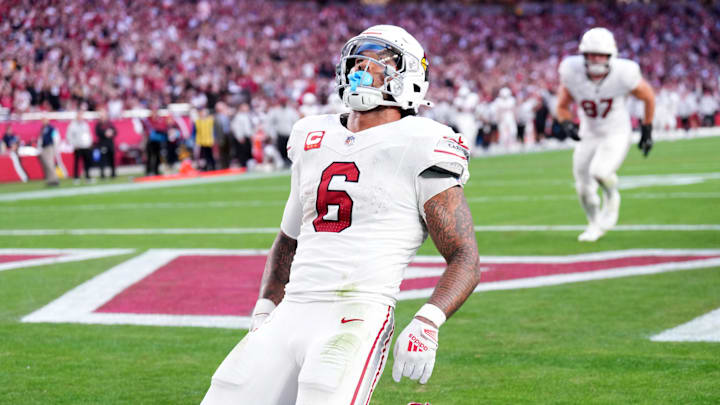 Dec 15, 2024; Glendale, Arizona, USA; Arizona Cardinals running back James Conner (6) celebrates a touchdown against the New England Patriots during the second half at State Farm Stadium. Mandatory Credit: Joe Camporeale-Imagn Images