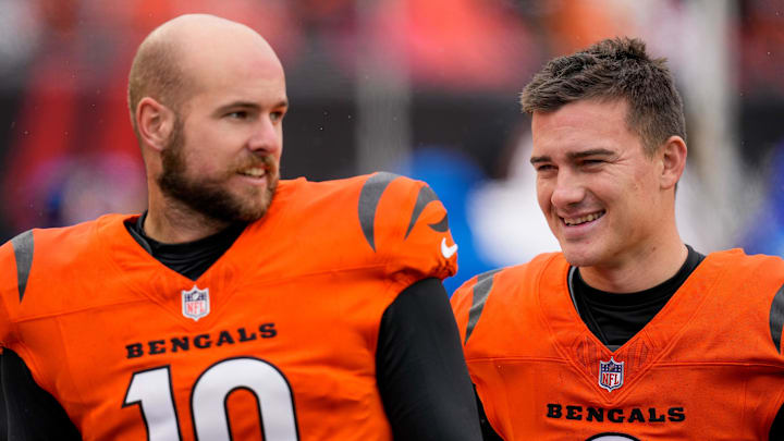 Cincinnati Bengals punter Brad Robbins (10) and place kicker Evan McPherson (2) walk the sideline in the first quarter of the NFL Week 12 game between the Cincinnati Bengals and the Pittsburgh Steelers at Paycor Stadium in Cincinnati on Sunday, Nov. 26, 2023.