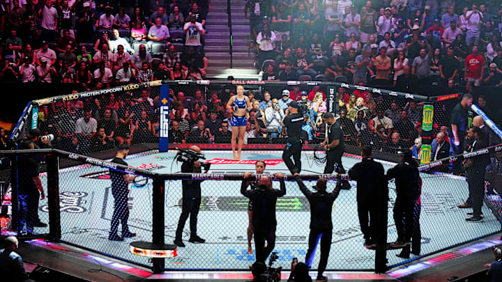 Jul 13, 2024; Denver, Colorado, USA; A view of the octagon before Rose Namajunas (red gloves) fights Tracy Cortez (blue gloves) during UFC Fight Night at Ball Arena.