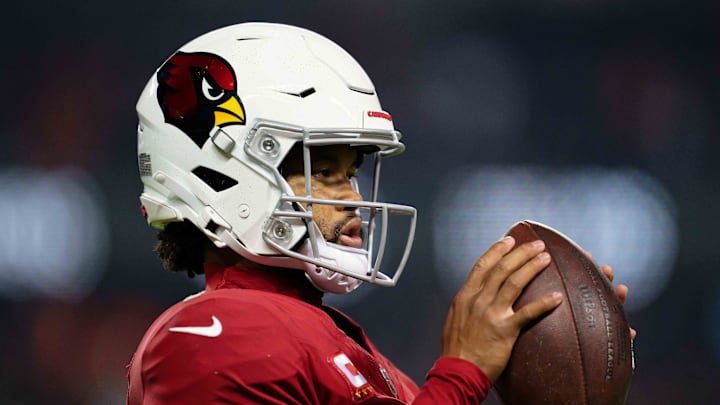 Dec 24, 2023; Chicago, Illinois, USA;  Arizona Cardinals quarterback Kyler Murray (1) warms up during a game against the Chicago Bears at Soldier Field. Mandatory Credit: Jamie Sabau-Imagn Images