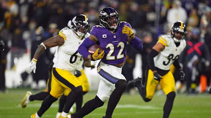 Jan 11, 2025; Baltimore, Maryland, USA; Baltimore Ravens running back Derrick Henry (22) runs to score a touchdown against the Pittsburgh Steelers in the third quarter in an AFC wild card game at M&T Bank Stadium. Mandatory Credit: Mitch Stringer-Imagn Images