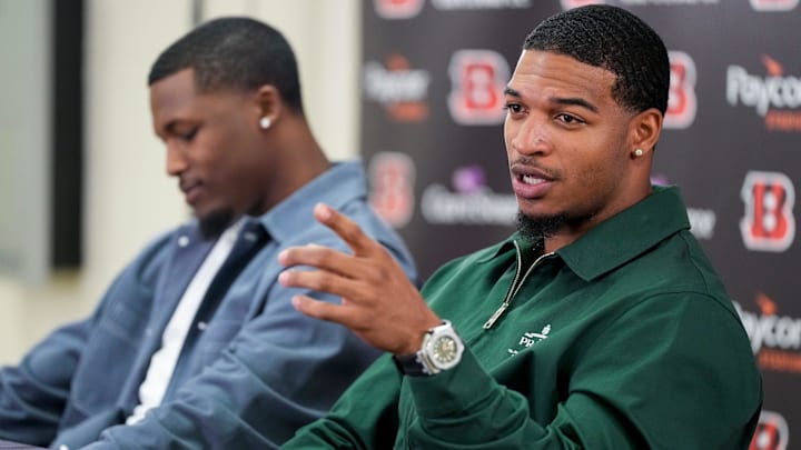 Ja’Marr Chase takes questions during a press conference to announce the signing of new contracts for Cincinnati Bengals wide receivers Ja’Marr Chase and Tee Higgins at Paycor Stadium in downtown Cincinnati on Tuesday, March 18, 2025. Chase becomes the new highest-paid non-quarterback player in the NFL.
