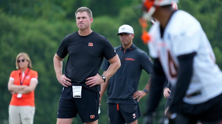 Cincinnati Bengals head coach Zac Taylor watches during a session of organized team activities on the Bengals practice field at Paycor Stadium in downtown Cincinnati on Tuesday, June 3, 2025.