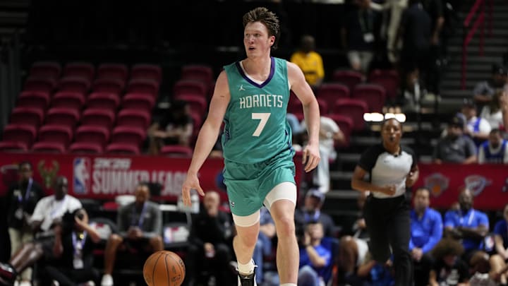 Jul 14, 2025; Las Vegas, NV, USA; Charlotte Hornets guard Kon Knueppel (7) dribbles the ball against the Dallas Mavericks during the second half of a NBA basketball game at the Thomas & Mack Center. Mandatory Credit: Lucas Peltier-Imagn Images