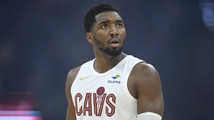 Cleveland Cavaliers guard Donovan Mitchell stands on the court in the first quarter against the Detroit Pistons. Cleveland Cavaliers guard Donovan Mitchell stands on the court in the first quarter against the Detroit Pistons.