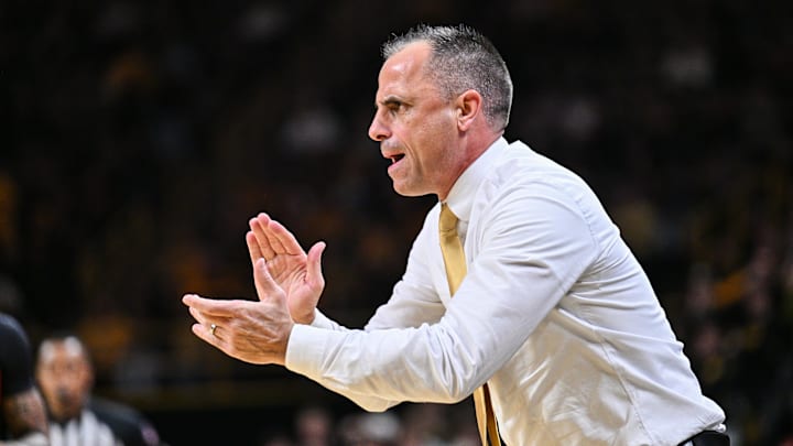 Dec 6, 2025; Iowa City, Iowa, USA; Iowa Hawkeyes head coach Ben McCollum reacts during the first half against the Maryland Terrapins at Carver-Hawkeye Arena. Mandatory Credit: Jeffrey Becker-Imagn Images