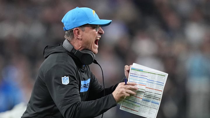 Jan 5, 2025; Paradise, Nevada, USA; Los Angeles Chargers coach Jim Harbaugh celebrates in the second half against the Las Vegas Raiders in the first half at Allegiant Stadium. Mandatory Credit: Kirby Lee-Imagn Images