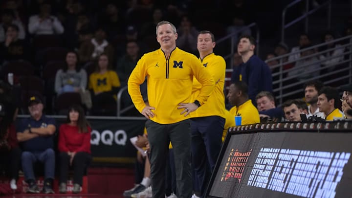 Jan 4, 2025; Los Angeles, California, USA; Michigan Wolverines head coach Dusty May reacts in the first half against the Southern California Trojans at Galen Center. Mandatory Credit: Kirby Lee-Imagn Images