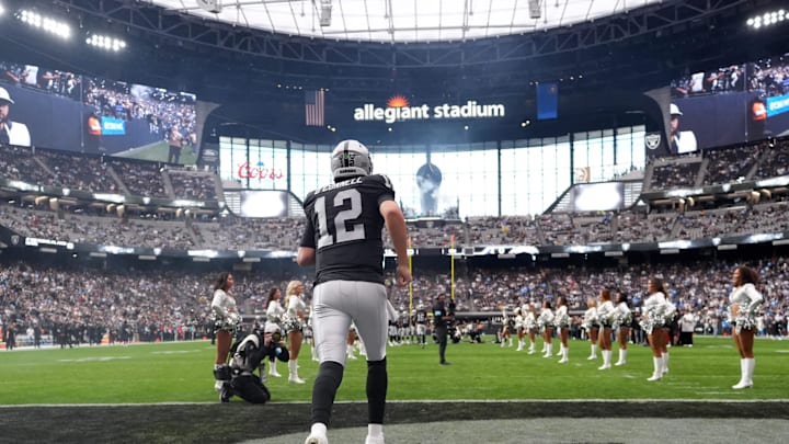 Jan 5, 2025; Paradise, Nevada, USA; Las Vegas Raiders quarterback Aidan O'Connell (12) enters the field before the game against the Los Angeles Chargers at Allegiant Stadium. Mandatory Credit: Kirby Lee-Imagn Images