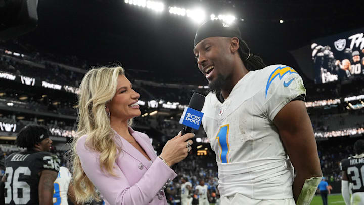 Jan 5, 2025; Paradise, Nevada, USA; CBS Sports reporter Melanie Collins (left) interviews Los Angeles Chargers wide receiver Quentin Johnston (1) after the game against the Las Vegas Raiders at Allegiant Stadium. Mandatory Credit: Kirby Lee-Imagn Images