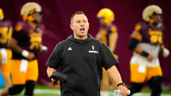 Arizona State head coach Kenny Dillingham yells to his team during a practice inside the Verde Dickey Dome in Tempe on August 12, 2025.