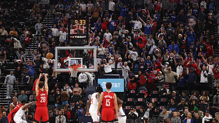 Dec 8, 2024; Inglewood, California, USA; Houston Rockets center Alperen Sengun (28) shoots a free throw as LA Clippers fans in ‘the wall’ attempt to distract him during the second quarter against the LA Clippers at Intuit Dome. Mandatory Credit: Jason Parkhurst-Imagn Images