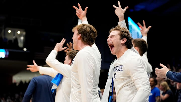 The Xavier Musketeers bench celebrates as they tie th game in the second half of the NCAA Tournament First Four game between the Xavier Musketeers and the Texas Longhorns at University of Dayton Arena in Dayton, Ohio, on Wednesday, March 19, 2025. Xavier advances with an 86-80 win over Texas, moving on to play Illinois in the first round.