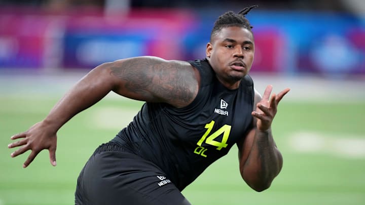 Feb 27, 2025; Indianapolis, IN, USA; Ohio State defensive lineman Ty Hamilton (DL14) participates in drills during the 2025 NFL Combine at Lucas Oil Stadium. Mandatory Credit: Kirby Lee-Imagn Images