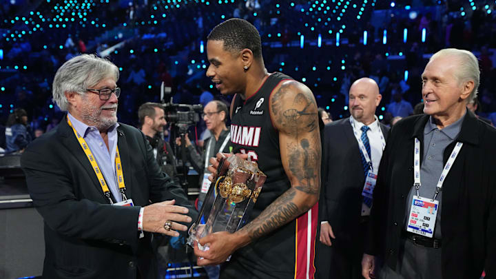 Feb 14, 2026; Los Angeles, CA, USA; Miami Heat forward Keshad Johnson (16) poses with Heat general partner Micky Arison (left) and former Heat coach Pat Riley after winning the slam dunk contest during NBA All Star Saturday Night at Intuit Dome. Mandatory Credit: Kirby Lee-Imagn Images