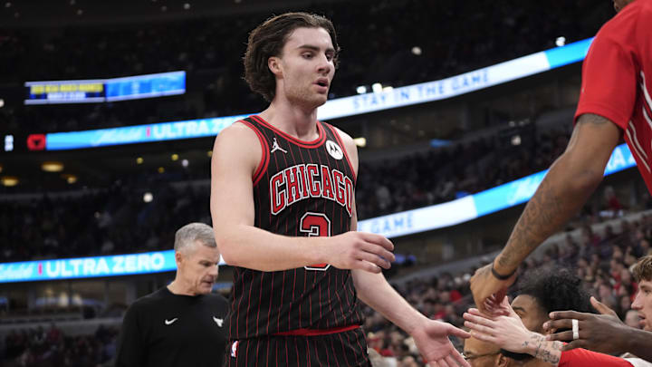 Dec 27, 2025; Chicago, Illinois, USA; Chicago Bulls guard Josh Giddey (3) is greeted as he comes to the bench in the game against the Milwaukee Bucks during the second half at United Center. Mandatory Credit: David Banks-Imagn Images