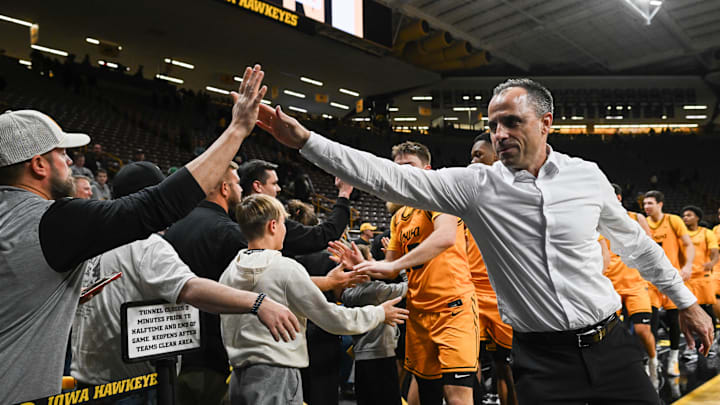 Nov 18, 2025; Iowa City, Iowa, USA; Iowa Hawkeyes head coach Ben McCollum greets fans after the game against the Southeast Missouri State Redhawks at Carver-Hawkeye Arena. Mandatory Credit: Jeffrey Becker-Imagn Images