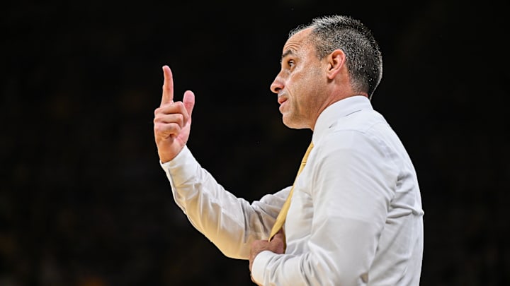 Nov 4, 2025; Iowa City, Iowa, USA; Iowa Hawkeyes head coach Ben McCollum reacts during the first half against the Robert Morris Colonials at Carver-Hawkeye Arena. Mandatory Credit: Jeffrey Becker-Imagn Images