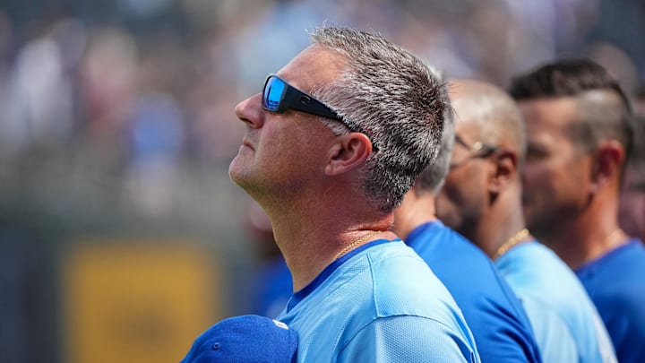 Sep 21, 2025; Kansas City, Missouri, USA;  Kansas City Royals manager Matt Quatraro (33) stands on field against the Toronto Blue Jays during the national anthem prior to a game at Kauffman Stadium. Mandatory Credit: Denny Medley-Imagn Images