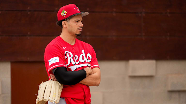 Cincinnati Reds pitcher Chase Burns (26) watches Hunter Greene throw a bullpen session at the Cincinnati Reds player development complex in Goodyear, Ariz., on Friday, Feb. 13, 2026.