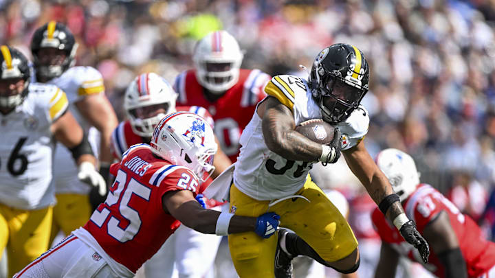 New England Patriots cornerback Marcus Jones tackles Pittsburgh Steelers running back Jaylen Warren. New England Patriots cornerback Marcus Jones tackles Pittsburgh Steelers running back Jaylen Warren.