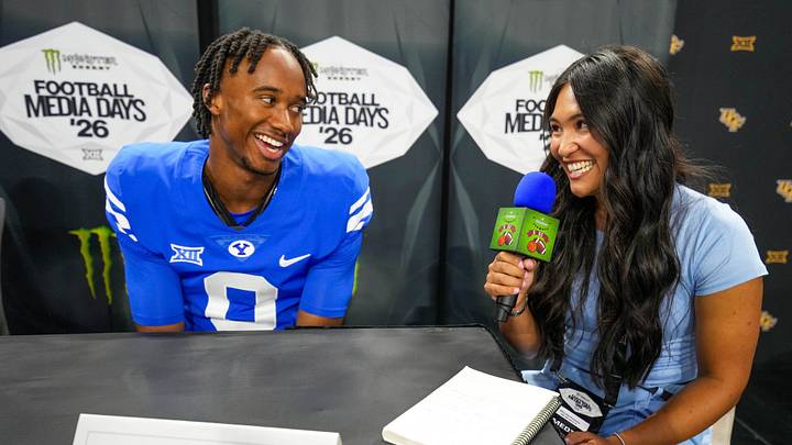 Jul 7, 2026; Frisco, TX, USA;  BYU  defensive back Evan Johnson speaks with a reporter during Big 12 Conference Football Media Days at The Star. Mandatory Credit: Raymond Carlin III-Imagn Images